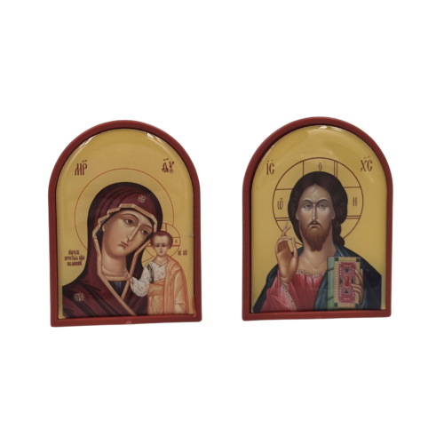 Small red and gold Orthodox icons featuring Jesus Christ or the Mother of God with Christ Child