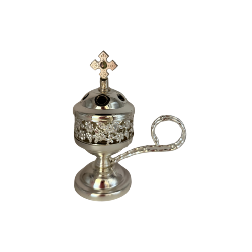 Small silver incense burner with floral detailing and cross